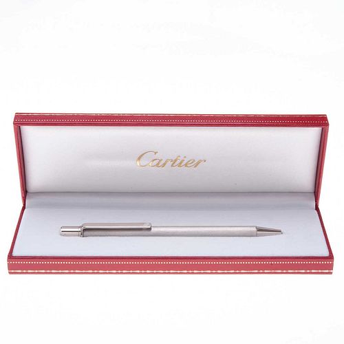 Artículos de escritura Bolígrafo Must II de Cartier. Cuerpo en acero acabado cepillado. Estuche, caja y certificado original.