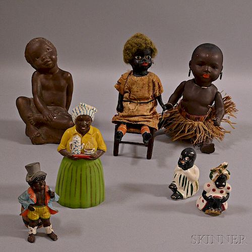 Seven Black Figures and Dolls