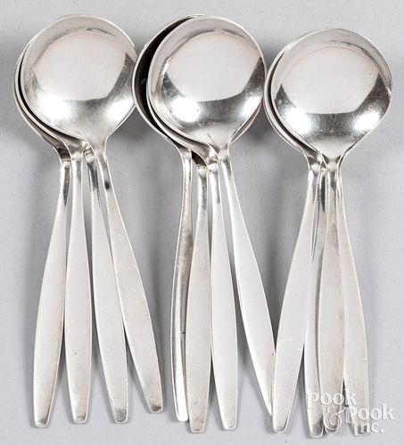 Twelve Georg Jensen sterling silver soup spoons