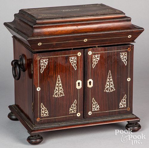 Rosewood valuables cabinet.