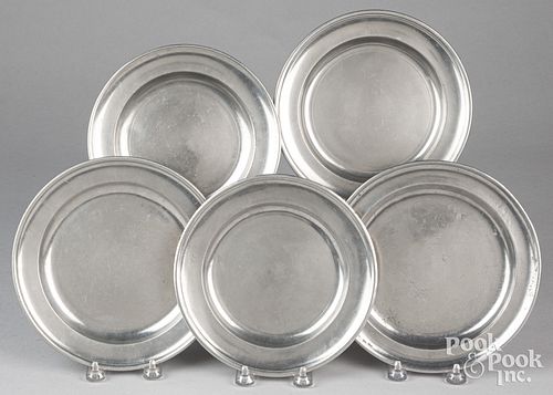 Five pewter plates