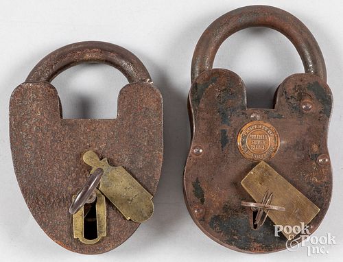 Two large iron padlocks