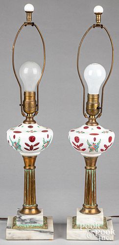 Pair of opaque cut to ruby glass table lamps.