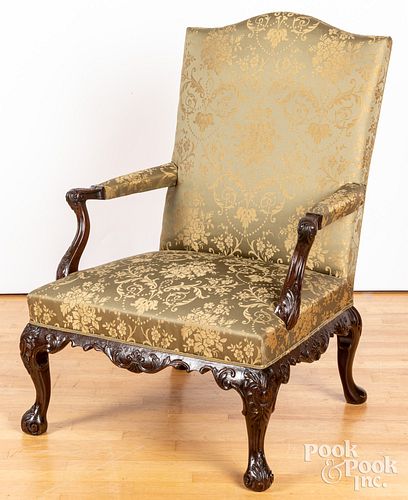 Chippendale style carved mahogany open armchair.