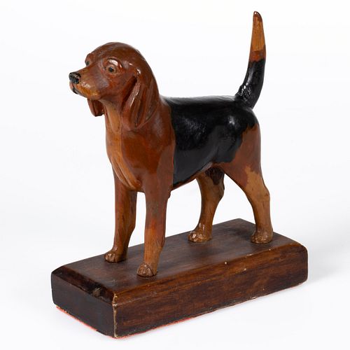 AMERICAN FOLK ART CARVED AND PAINTED WOODEN FIGURE OF A DOG