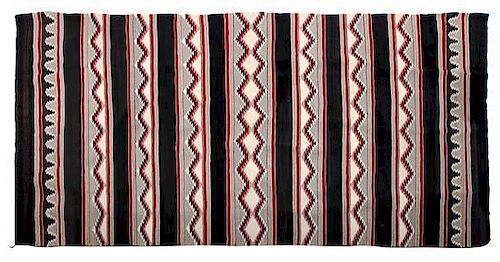 A Navajo Chinle Rug 101 x 62 inches.
