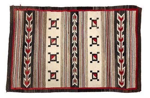 A Navajo Chinle Banded Weaving 58 x 40 inches.