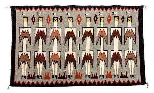 Two Contemporary Navajo Yei Weavings Largest: 52 1/2 x 34 inches.