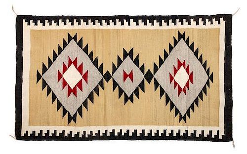 A Navajo Western Reservation Rug 63 1/2 x 38 inches.