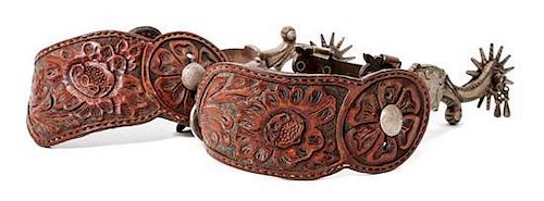 A Pair of E. Garcia Acanthus Carved Spurs with Tooled Leather Strap
