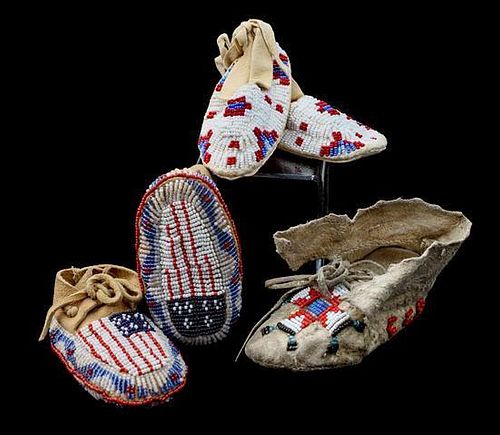 Two Pairs of Northern Plains Child's Moccasins Length of longest 4 1/2 inches.
