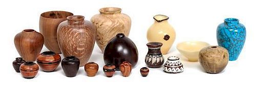 Fourteen Miniature Turned Wood Vessels Height of tallest 1 5/8 inches.