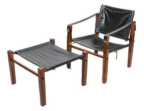 An American Black Leather Safari Chair and Ottoman Height 29 x width 22 3/4 x depth 23 1/4 inches.