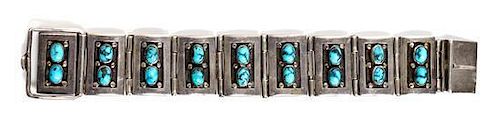 A Hopi Silver and Turquoise Link Bracelet, Lewis Lomay Length 8 inches.