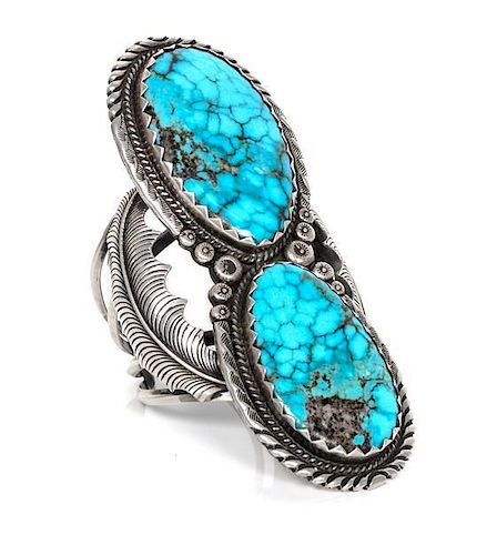 An Navajo Oversized Turquoise Bracelet, Stover Paul, Length 6 plus opening of 1 x width 3 1/4 x depth 5 3/4 inches.