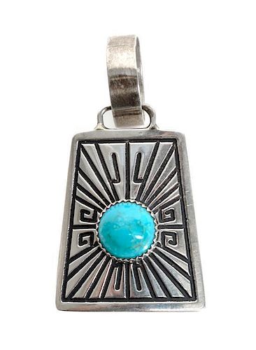 A Navajo Silver and Turquoise Pendant, Tommy Singer Height 2 1/4 inches.