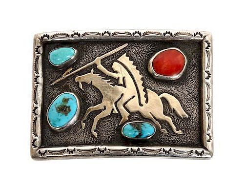 A Cheyenne Silver, Turquoise and Coral Belt Buckle, Ben Nighthorse Campbell (b. 1933) Height 2 1/8 x width 2 5/ 8 inches.