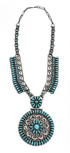 A Navajo Pendant Neclace, Victor Moses Begay Length 22 inches; diameter of medallion 3 inches.