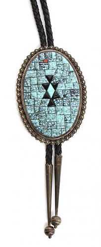 A Navajo Silver, Turquoise, Jet and Coral Bolo, Robert Henry Jr. Height 3 1/8 x width 2 1/8 inches.