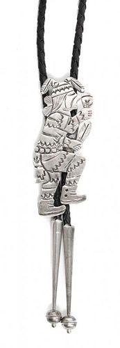 A Navajo Silver Figural Bolo, Floyd or Lloyd Becenti Height 3 x width 1 1/8 inches.