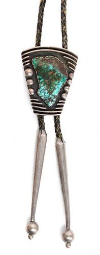 A Southwestern Silver and Turquoise Bolo Height 2 x 1/2 inches.