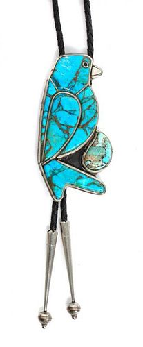 A Southwestern Silver and Turquoise Bolo Height 3 1/2 x width 1 3/4 inches.