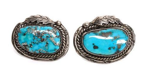 A Pair of Southwestern Silver and Turquoise Cufflinks Length 1/4 inches.