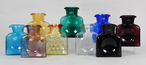 Nine Blenko colored glass water bottles