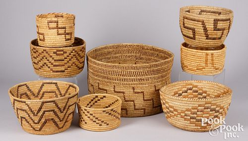 Eight Papago Indian straight-walled baskets