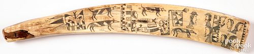 Large intricately carved scrimshaw tusk