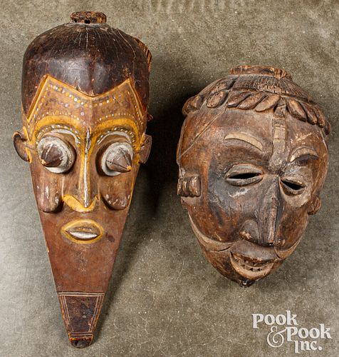 Two carved tribal African masks