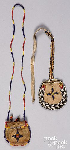 Two Apache Indian beaded hide pouches