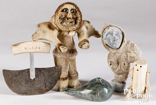 Group of stone and bone carved Inuit items