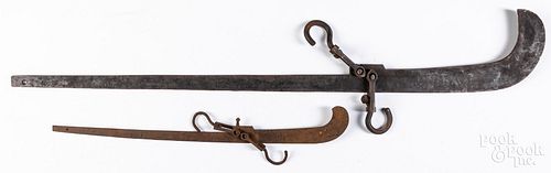 Two iron scales, both marked N. Custer