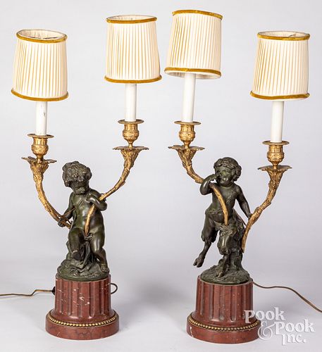 Pair of French bronze putti table lamps
