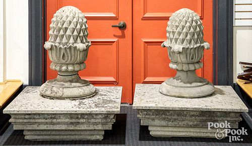 Pair of limestone pineapple gate post capitals