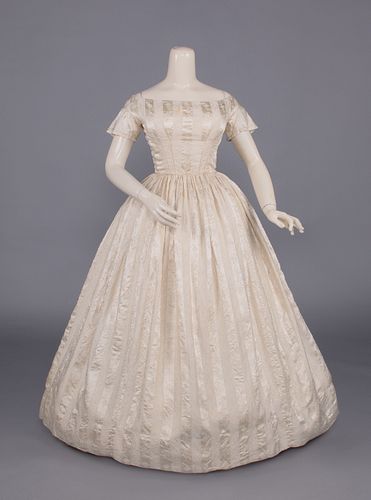 CREAM PATTERNED SILK GOWN, c. 1850