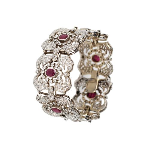 Gold bracelet with rubies and diamonds.