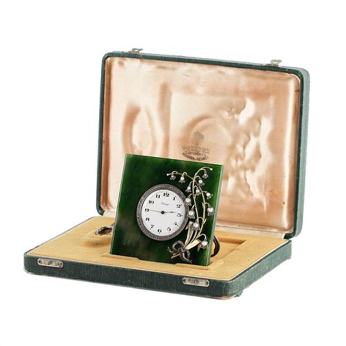 Table clock in gold  silver and jade. In the style of Carl Faberge. Russia. 20th century.