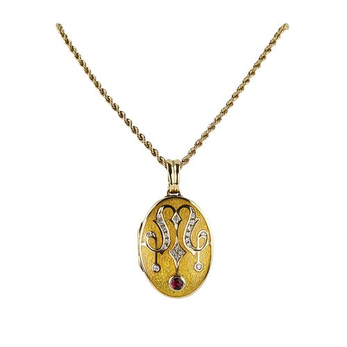 Gold pendant on a chain with a ruby  in the original case. Faberge  France.