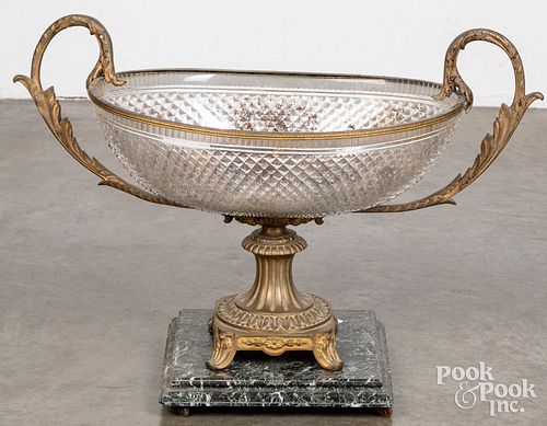 Gilt metal and glass centerpiece, with marble base