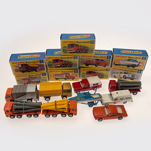 Group Of Nine Boxed Matchbox Superfast Vehicles, Including: 1 Mercedes Truck, gold body, removable orange canopy, five spoke wheels; 3 Mercedes Benz B