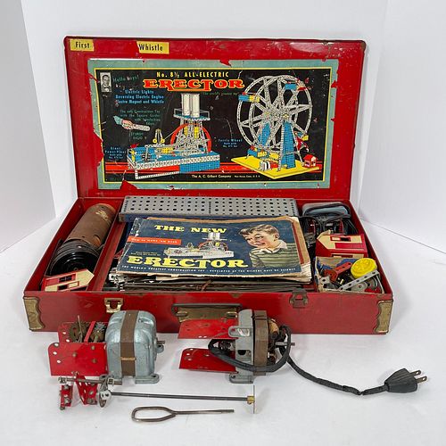 An A.C. Gilbert Co. No. 8 1/2 Erector Set With Motor And Three Manuals, In large red painted metal box with label to interior showing a colorful illus