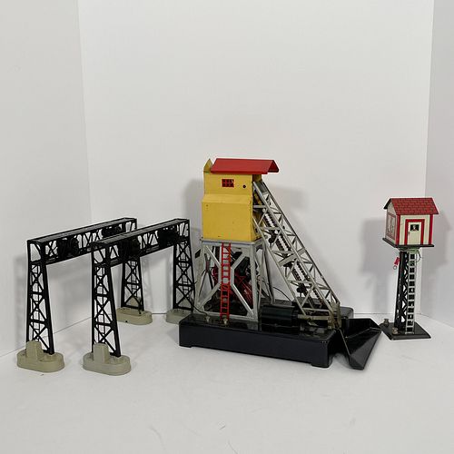 A Vintage Lionel O Gauge 97 Coal Elevator And Three Other Accessories, All unboxed, the Coal Elevator featuringa yellow and red tinplate loft with a s