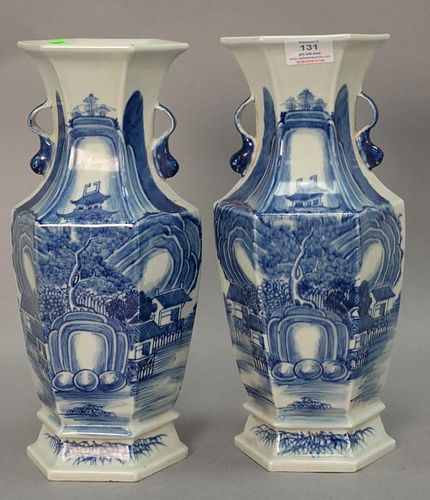Pair of blue and white porcelain vases with landscape scenes. ht. 14in.