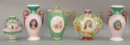 Five porcelain portrait pieces to include a pair of French porcelain urns, Napoleon bud vase, porcelain coffee pot with cherubs, and...