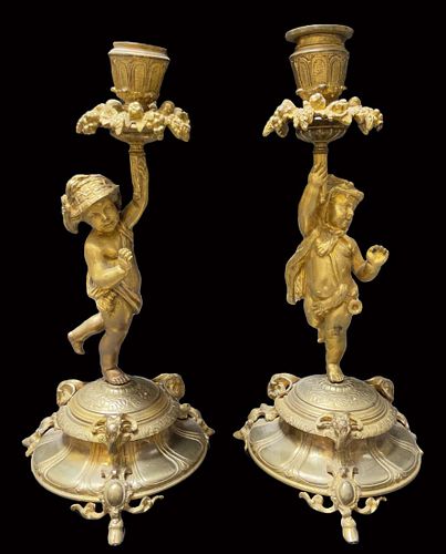 A Pair Of 19th C. French Gilt Bronze Figural Candlesticks