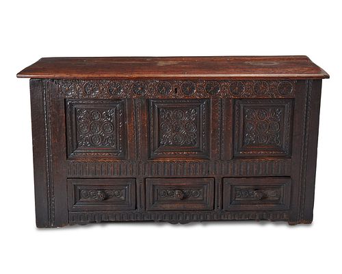 An English carved oak bridal chest