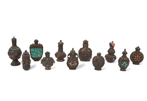 A group of Tibetan silver and semiprecious snuff bottles