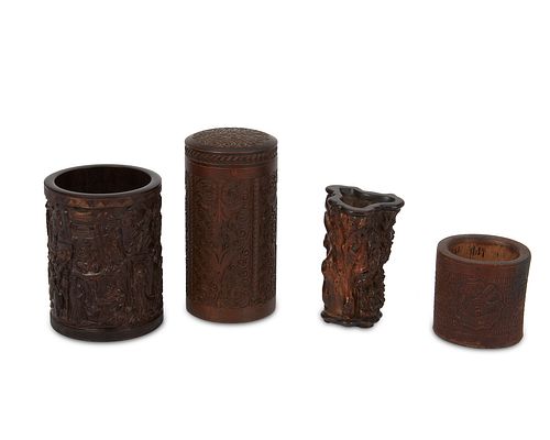 A group of East Asian carved wood vessels